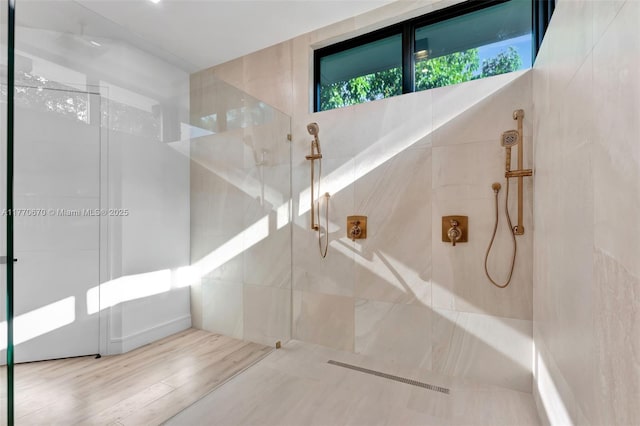 11143 NE 8th Ave, Biscayne Park, FL 33161 - full bath featuring a walk in shower and wood finished floors