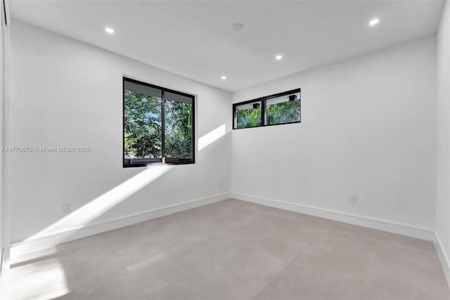 11143 NE 8th Ave, Biscayne Park, FL 33161 - spare room with recessed lighting, baseboards, and finished concrete floors