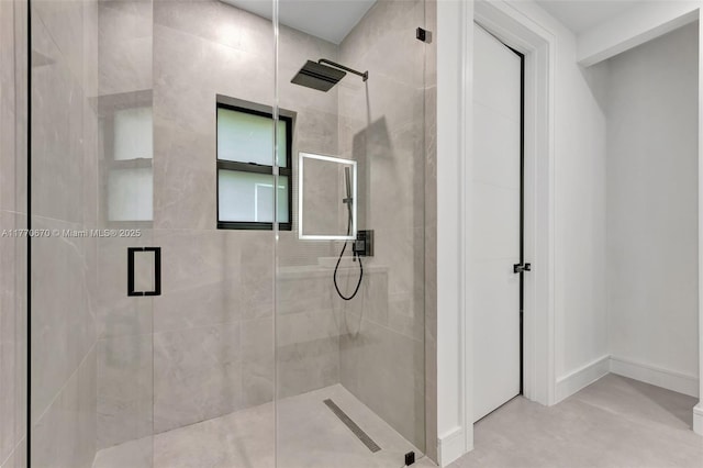 11143 NE 8th Ave, Biscayne Park, FL 33161 - bathroom featuring a stall shower and baseboards