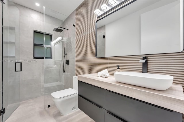 11143 NE 8th Ave, Biscayne Park, FL 33161 - full bath with a stall shower, toilet, tile walls, vanity, and tile patterned flooring