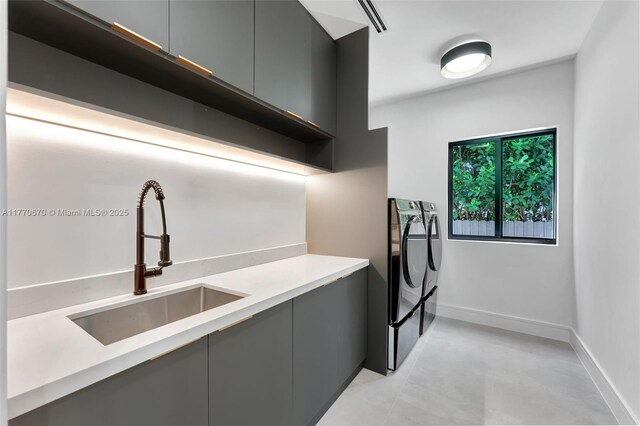 11143 NE 8th Ave, Biscayne Park, FL 33161 - kitchen featuring separate washer and dryer, modern cabinets, gray cabinetry, and open shelves