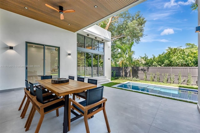 11143 NE 8th Ave, Biscayne Park, FL 33161 - view of patio with a ceiling fan, a fenced backyard, and outdoor dining space