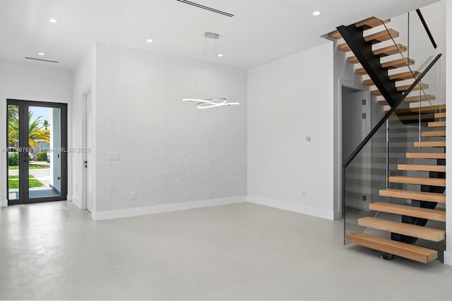 1320 NE 16th Ave, Fort Lauderdale, FL 33304 - staircase with baseboards, concrete floors, and recessed lighting
