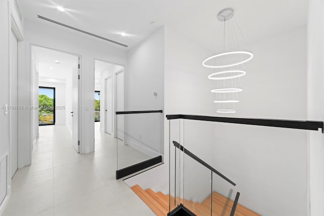 1320 NE 16th Ave, Fort Lauderdale, FL 33304 - stairs with a chandelier and recessed lighting