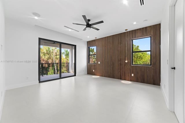 1320 NE 16th Ave, Fort Lauderdale, FL 33304 - empty room featuring wood walls, ceiling fan, baseboards, and recessed lighting