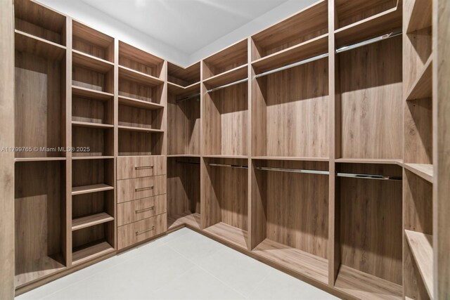 1320 NE 16th Ave, Fort Lauderdale, FL 33304 - spacious closet with tile patterned floors