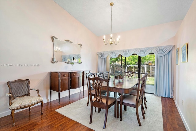 15827 Waverly Mnr, Davie, FL 33331 - dining room featuring a chandelier, wood finished floors, baseboards, and lofted ceiling