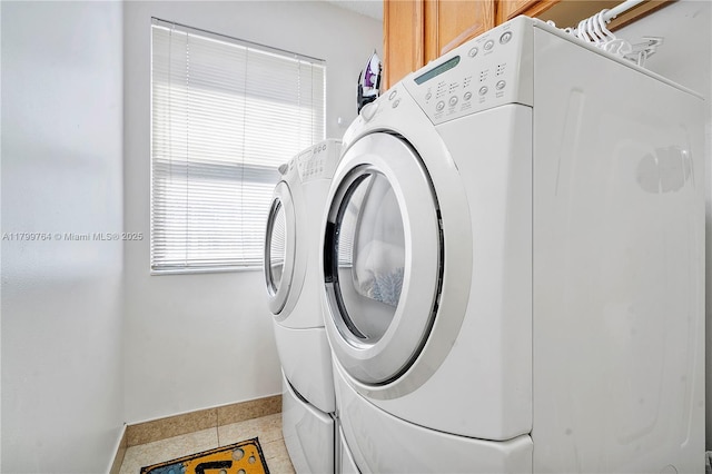 15827 Waverly Mnr, Davie, FL 33331 - laundry area featuring cabinet space, baseboards, and washing machine and dryer