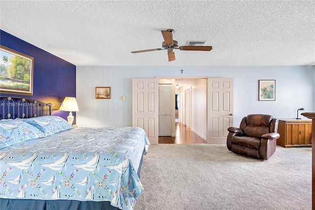 15827 Waverly Mnr, Davie, FL 33331 - bedroom with carpet flooring, a textured ceiling, and a ceiling fan