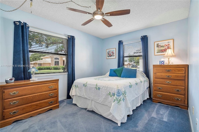 15827 Waverly Mnr, Davie, FL 33331 - bedroom with dark colored carpet, multiple windows, a textured ceiling, and ceiling fan