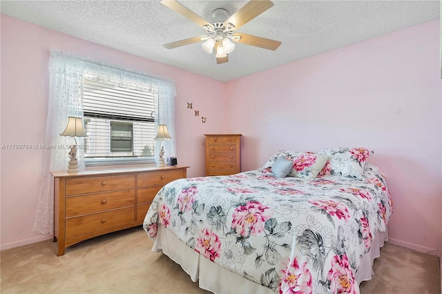 15827 Waverly Mnr, Davie, FL 33331 - bedroom with light colored carpet, a textured ceiling, a ceiling fan, and baseboards
