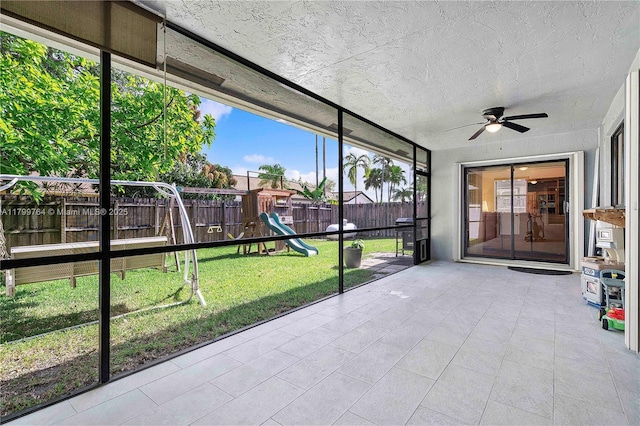 15827 Waverly Mnr, Davie, FL 33331 - unfurnished sunroom featuring ceiling fan and healthy amount of natural light