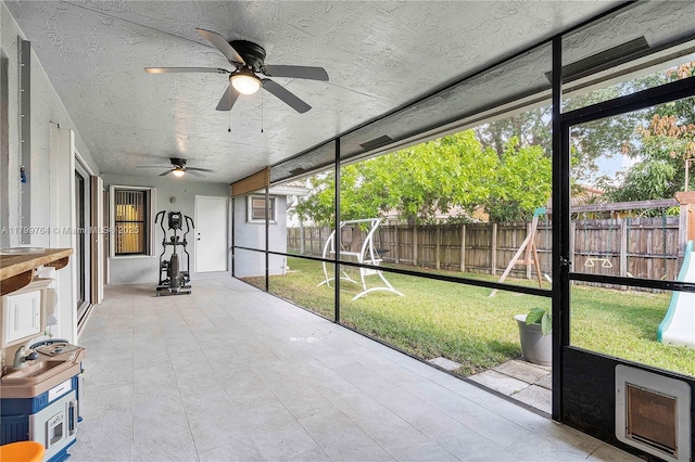 15827 Waverly Mnr, Davie, FL 33331 - unfurnished sunroom with ceiling fan and plenty of natural light