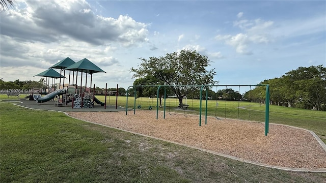 15827 Waverly Mnr, Davie, FL 33331 - communal playground featuring a lawn
