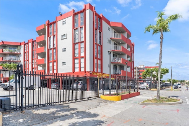 1750 W 46th St Unit 528, Hialeah, FL 33012 - view of apartment building / complex featuring fence