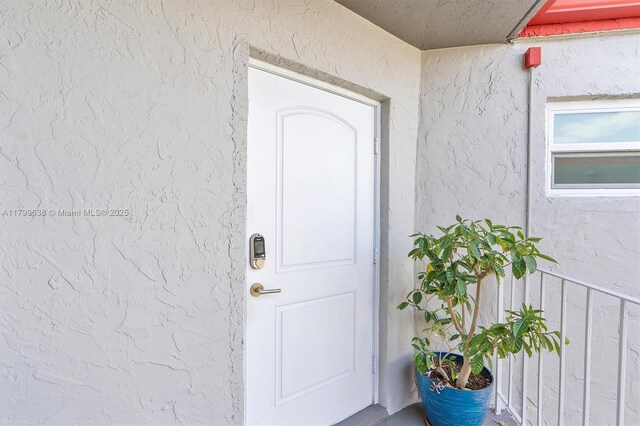 1750 W 46th St Unit 528, Hialeah, FL 33012 - entrance to property with stucco siding