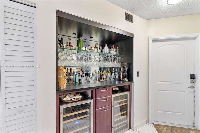 1750 W 46th St Unit 528, Hialeah, FL 33012 - indoor dry bar featuring beverage cooler, a textured ceiling, and light tile patterned floors