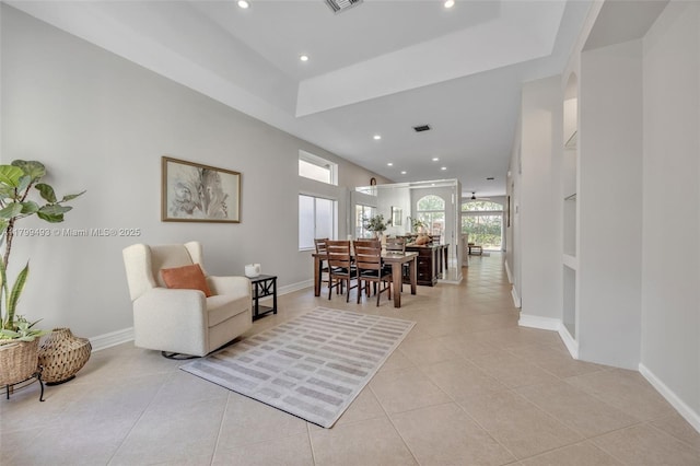 5020 Ibis Ct, Coconut Creek, FL 33073 - living area with light tile patterned floors, recessed lighting, baseboards, and a raised ceiling