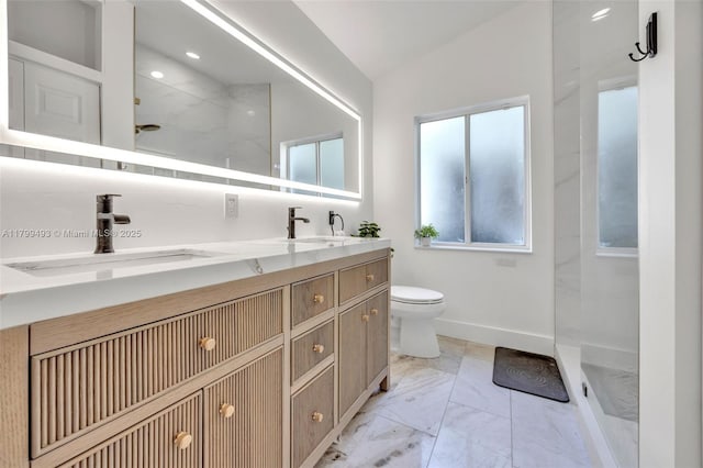 5020 Ibis Ct, Coconut Creek, FL 33073 - full bathroom with toilet, marble finish flooring, a walk in shower, double vanity, and baseboards