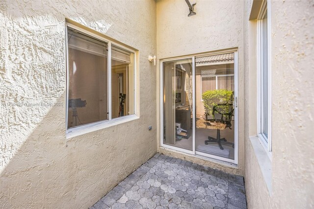 5020 Ibis Ct, Coconut Creek, FL 33073 - view of exterior entry with stucco siding