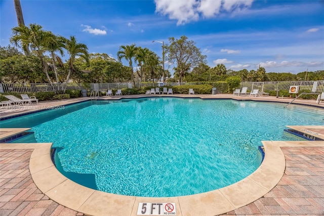 5020 Ibis Ct, Coconut Creek, FL 33073 - community pool with fence and a patio