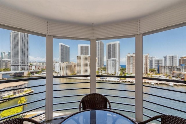 100 Golden Isles Dr Unit 1105, Hallandale Beach, FL 33009 - balcony featuring a skyline view and a water view