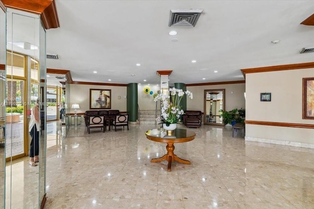100 Golden Isles Dr Unit 1105, Hallandale Beach, FL 33009 - building lobby with ornamental molding and recessed lighting
