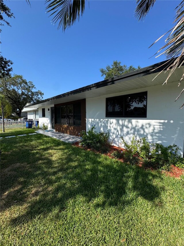 421 SW 11th Ave, Hallandale Beach, FL 33009 - view of front of home with a front lawn and stucco siding