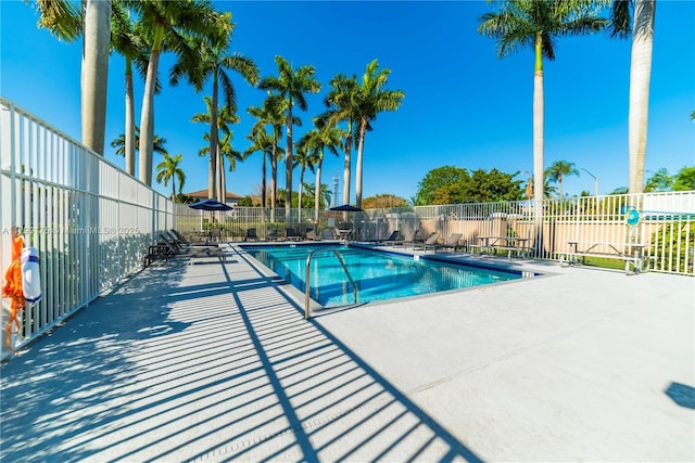 16818 SW 1st Mnr, Pembroke Pines, FL 33027 - community pool featuring fence and a patio