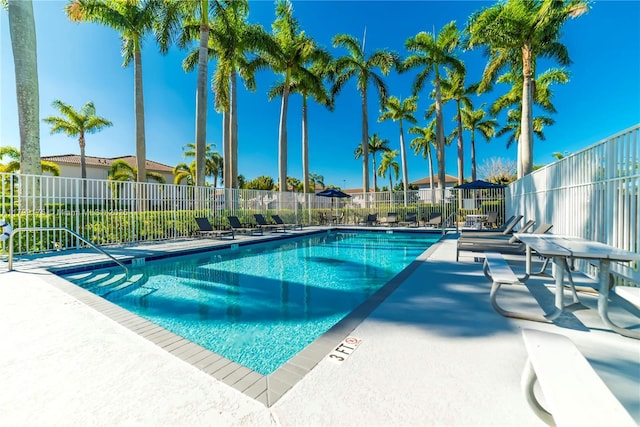 16818 SW 1st Mnr, Pembroke Pines, FL 33027 - community pool with fence and a patio area
