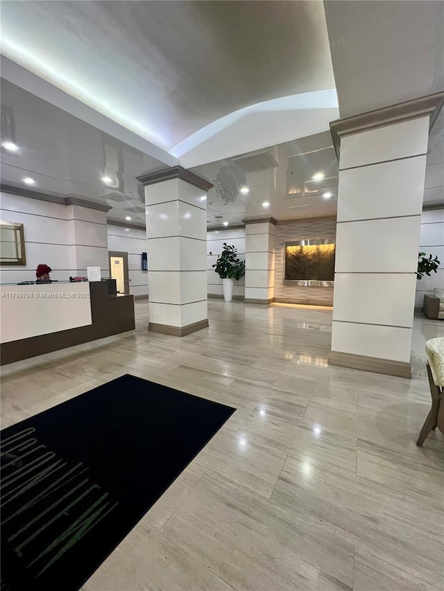welcome area featuring decorative columns