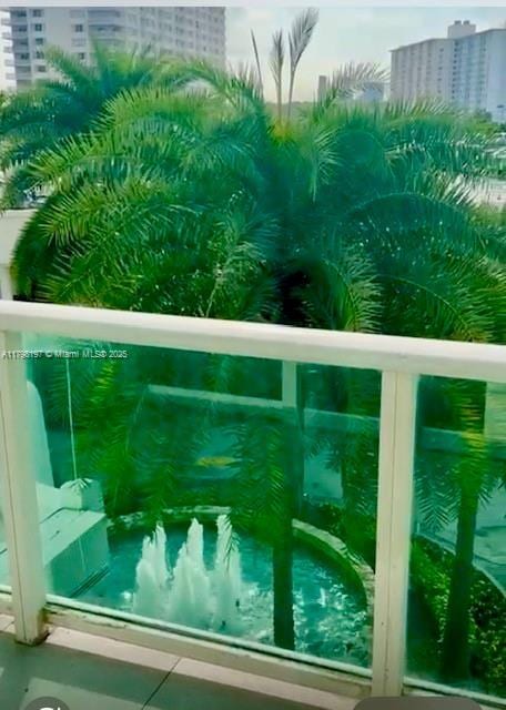 balcony featuring a view of city