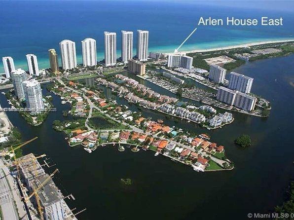 aerial overview of property's location with a large body of water and nearby urban area