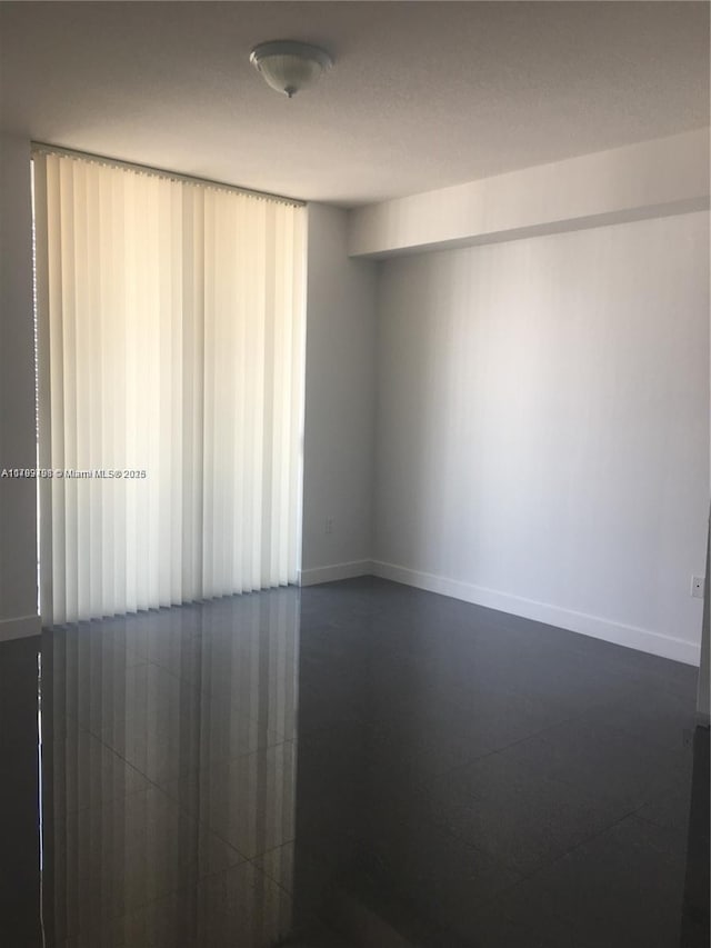 1111 SW 1st Ave Unit 2223-N, Miami, FL 33130 - unfurnished room with baseboards