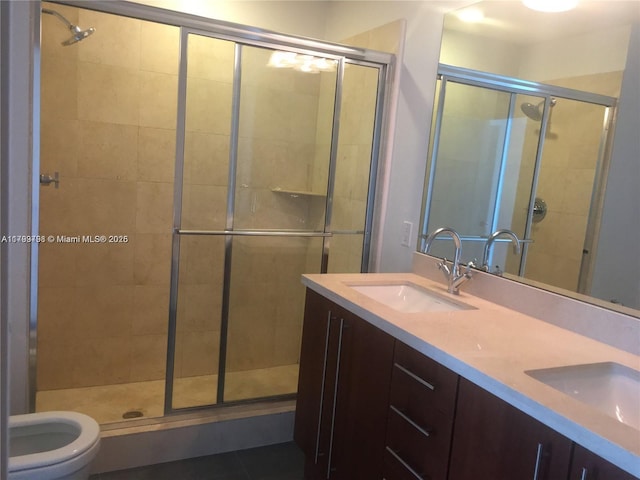 1111 SW 1st Ave Unit 2223-N, Miami, FL 33130 - bathroom featuring a shower stall, toilet, and double vanity
