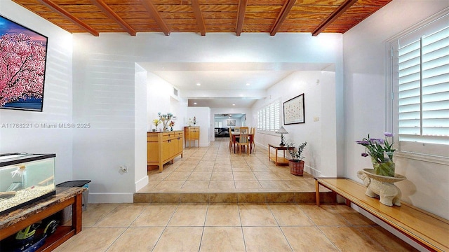 5010 SW 111th Ave, Miami, FL 33165 - corridor with light tile patterned flooring, wooden ceiling, plenty of natural light, and baseboards