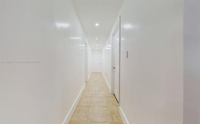 5010 SW 111th Ave, Miami, FL 33165 - corridor featuring light tile patterned floors, recessed lighting, and baseboards
