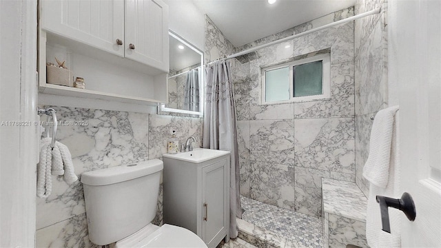 5010 SW 111th Ave, Miami, FL 33165 - bathroom featuring a tile shower, toilet, tile walls, and vanity