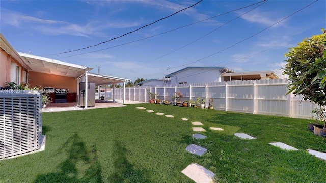 5010 SW 111th Ave, Miami, FL 33165 - view of yard featuring central air condition unit and a patio