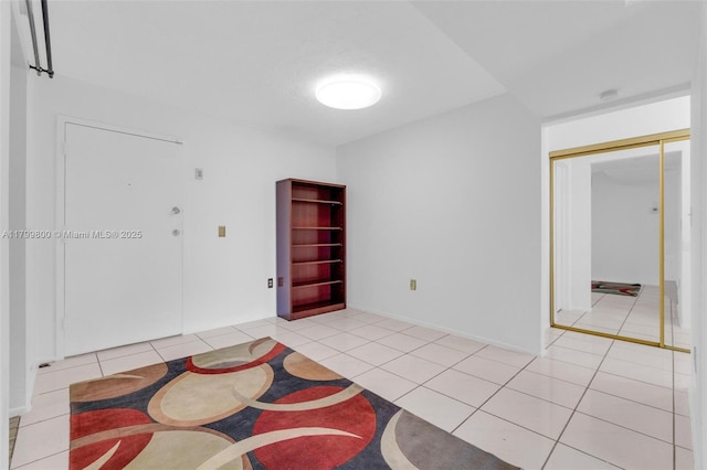 7300 NW 17th St Unit 203, Plantation, FL 33313 - empty room with light tile patterned flooring