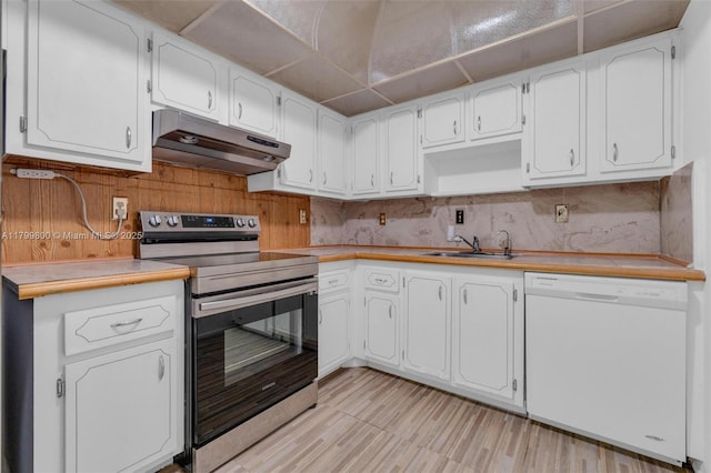 7300 NW 17th St Unit 203, Plantation, FL 33313 - kitchen with dishwasher, electric range, under cabinet range hood, light countertops, and tasteful backsplash
