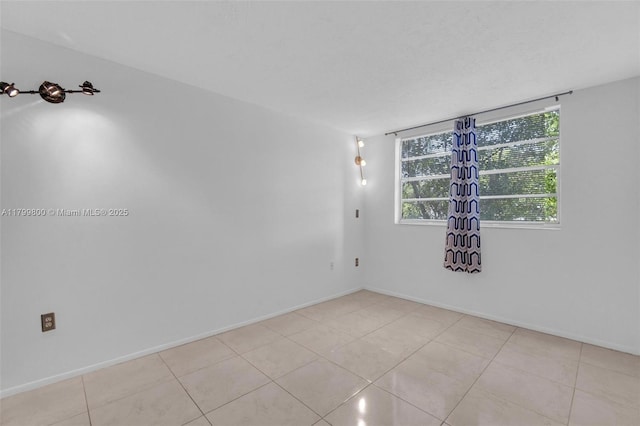 7300 NW 17th St Unit 203, Plantation, FL 33313 - empty room with light tile patterned floors