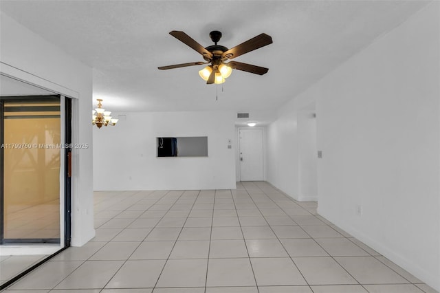 20260 NE 3rd Ct Unit 5, Miami, FL 33179 - unfurnished room with a chandelier, a ceiling fan, and light tile patterned floors
