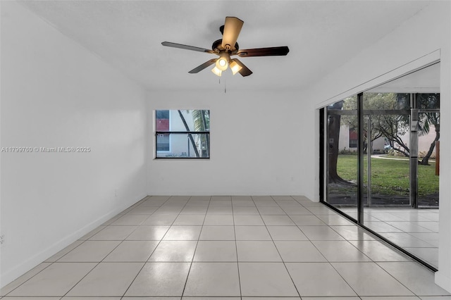 20260 NE 3rd Ct Unit 5, Miami, FL 33179 - empty room with ceiling fan and light tile patterned flooring