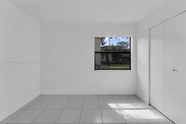 20260 NE 3rd Ct Unit 5, Miami, FL 33179 - unfurnished room featuring light tile patterned flooring