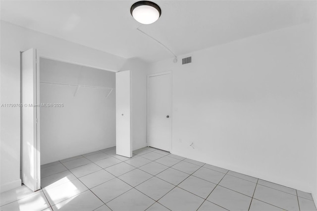 20260 NE 3rd Ct Unit 5, Miami, FL 33179 - unfurnished bedroom with light tile patterned floors and a closet