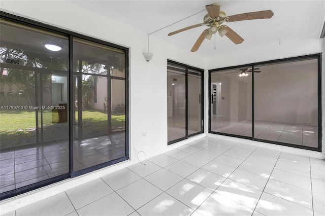 20260 NE 3rd Ct Unit 5, Miami, FL 33179 - empty room featuring tile patterned floors and a ceiling fan