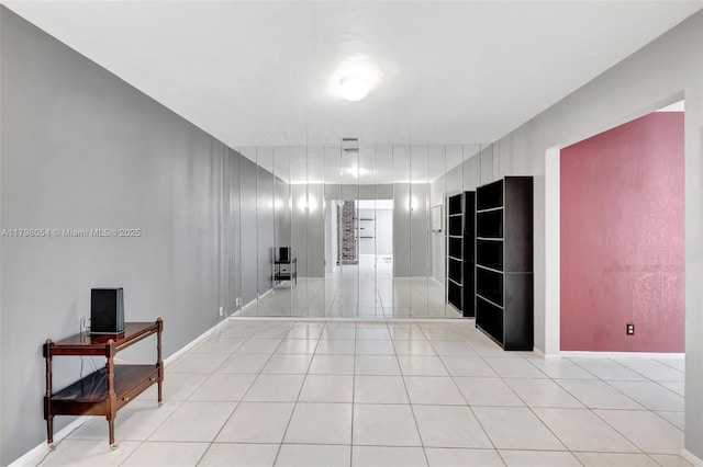 2730 NW 105th Ter, Coral Springs, FL 33065 - spare room featuring light tile patterned floors and baseboards