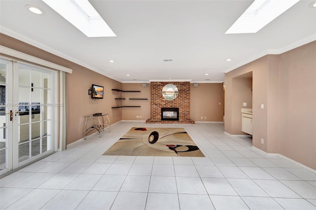 2730 NW 105th Ter, Coral Springs, FL 33065 - unfurnished living room with a skylight, crown molding, light tile patterned flooring, baseboards, and a fireplace
