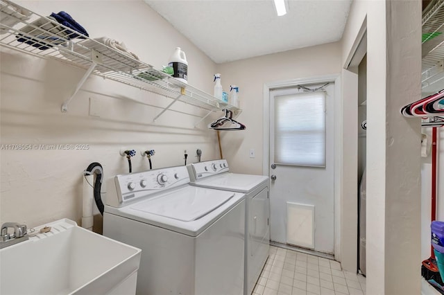 2730 NW 105th Ter, Coral Springs, FL 33065 - laundry room featuring separate washer and dryer and light tile patterned floors